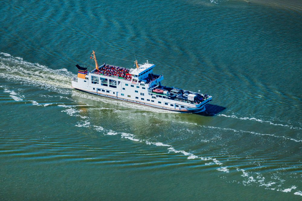 Aerial image Norden - Trip of a ferry ship of the AG Reederei Norden-Frisia ship Frisia 1 in the district of Norddeich in Norden in the state Lower Saxony, Germany