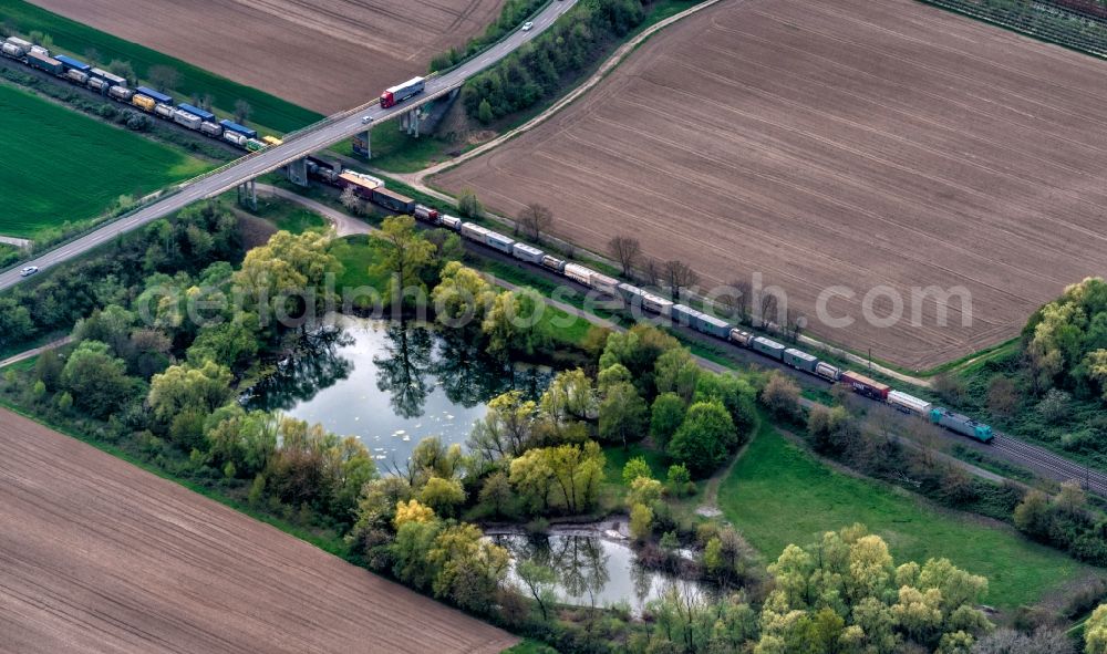 Ringsheim from the bird's eye view: Ride a train on the track Rheintal in Ringsheim in the state Baden-Wurttemberg, Germany