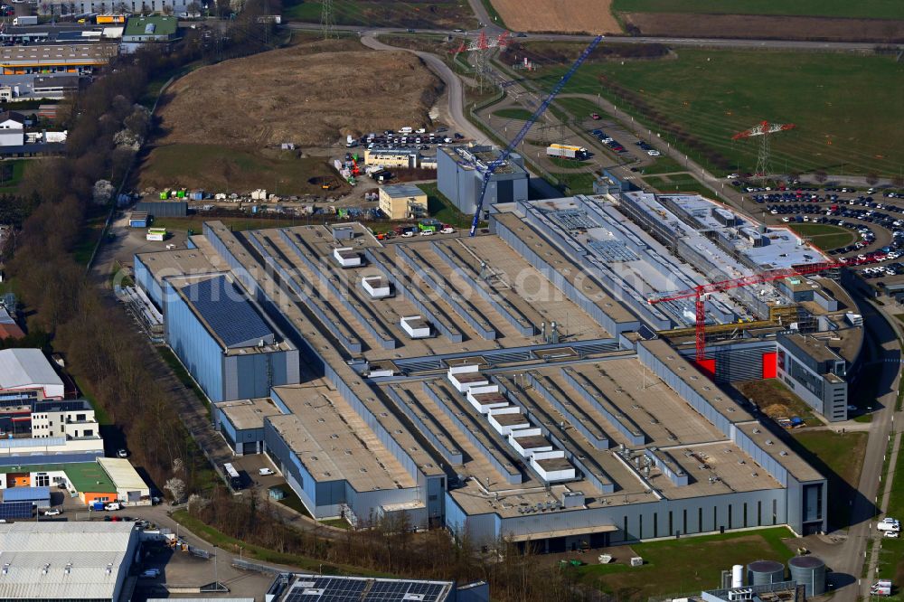 Aerial photograph Bruchsal - Buildings and production halls on the vehicle manufacturing site and large gearbox factory of SEW-EURODRIVE GmbH on Industriestrasse in the district of Untergrombach in Bruchsal in the state Baden-Wuerttemberg, Germany