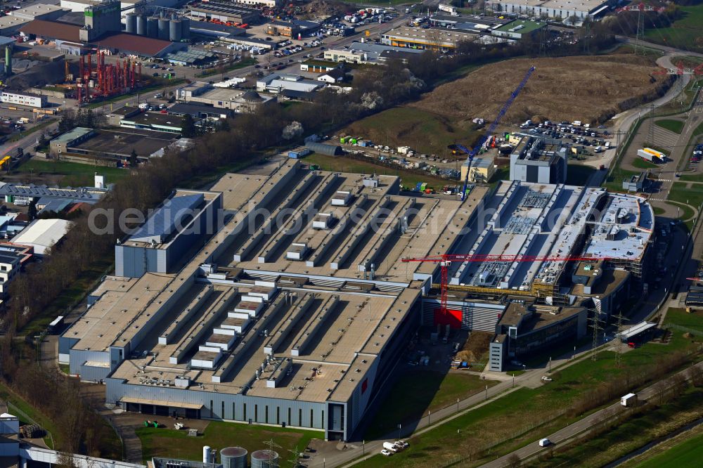 Bruchsal from above - Buildings and production halls on the vehicle manufacturing site and large gearbox factory of SEW-EURODRIVE GmbH on Industriestrasse in the district of Untergrombach in Bruchsal in the state Baden-Wuerttemberg, Germany
