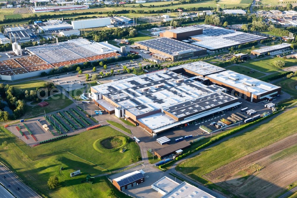 Aerial image Bruchsal - Buildings and production halls on the vehicle construction site of John Deere GmbH & Co. KG on John-Deere-Strasse in the district Untergrombach in Bruchsal in the state Baden-Wurttemberg, Germany