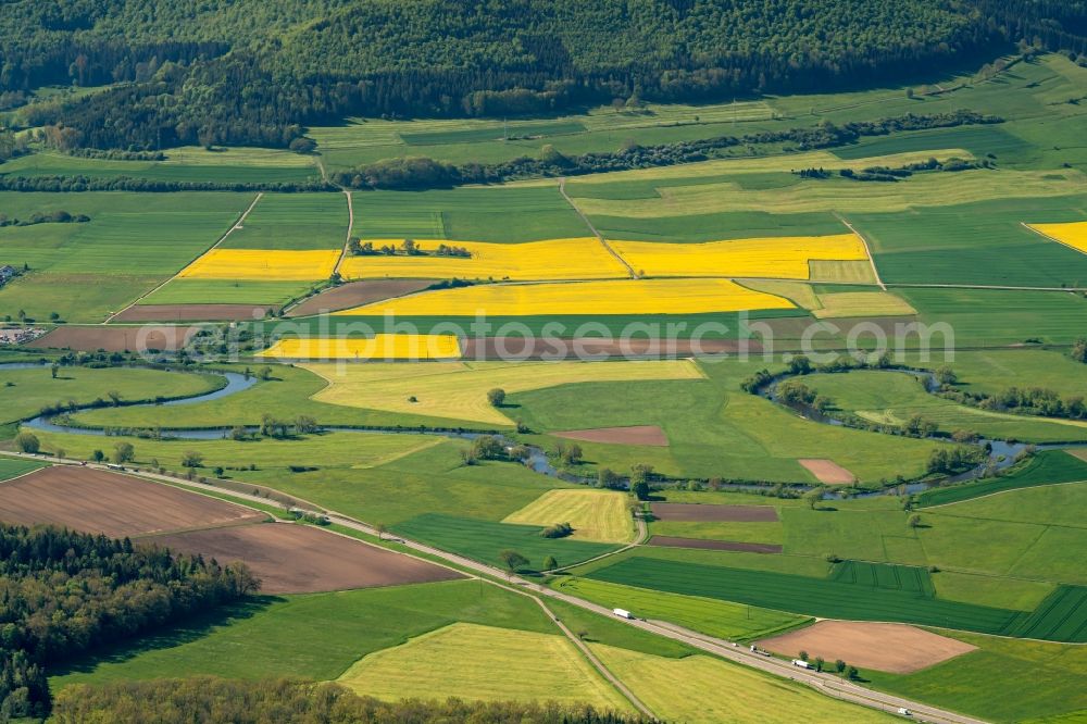 Aerial photograph Donaueschingen - Field landscape yellow flowering rapeseed flowers in Donaueschingen in the state Baden-Wuerttemberg, Germany