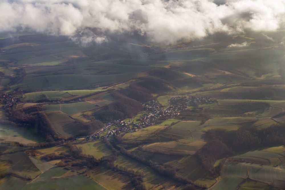 Duderstadt from the bird's eye view: Agricultural fields with adjacent forest and forest areas in Duderstadt in the state Lower Saxony, Germany