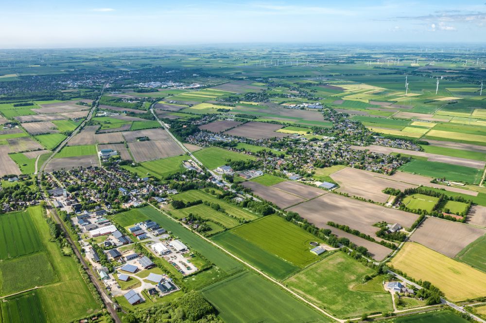 Risum-Lindholm from above - Agricultural fields with adjacent forest and forest areas Legerade in Risum-Lindholm North Friesland in the state Schleswig-Holstein, Germany