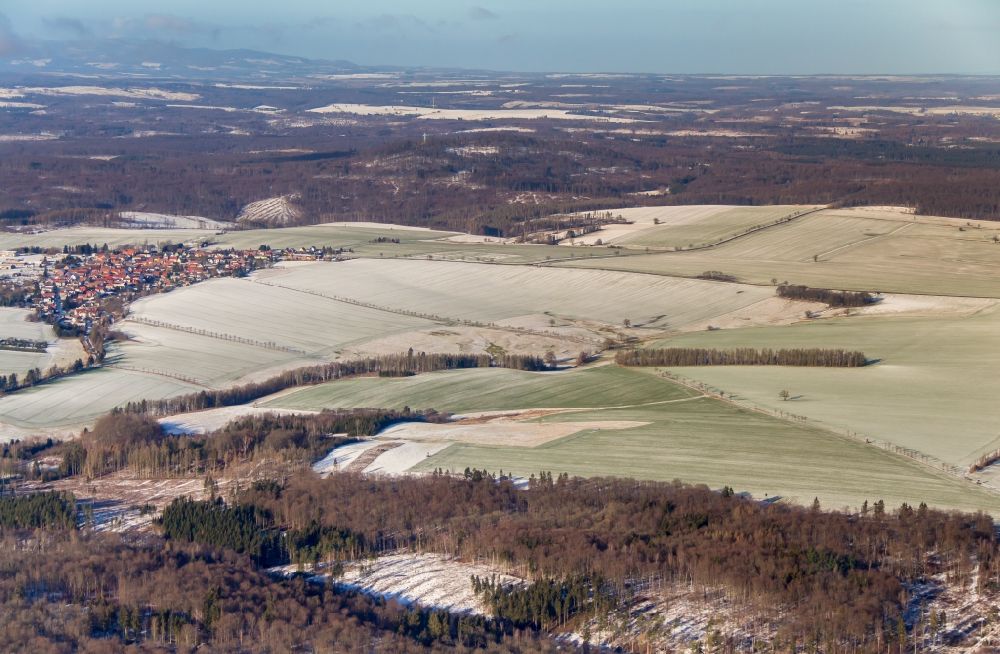 Aerial image Sangerhausen - Agricultural fields with adjacent forest and forest areas bei Wippra in Sangerhausen in the state Saxony-Anhalt, Germany