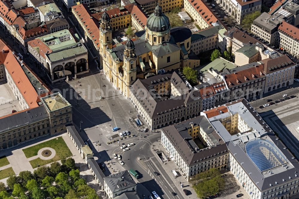 München from above - Feldherrnhalle and Theatine Church of St. Cajetan on the square Odeonsplatz in the Maxvorstadt part of Munich in the state of Bavaria. The Feldherrnhalle ( Field Marshals' Hall) is a monumental loggia on the southern edge of the square. Next to it is the catholic church, a former court and royal church of the Theatine Order. With its two towers in the italian late baroque style, it is part of the Odeon's Square complex of buildings and landmarks