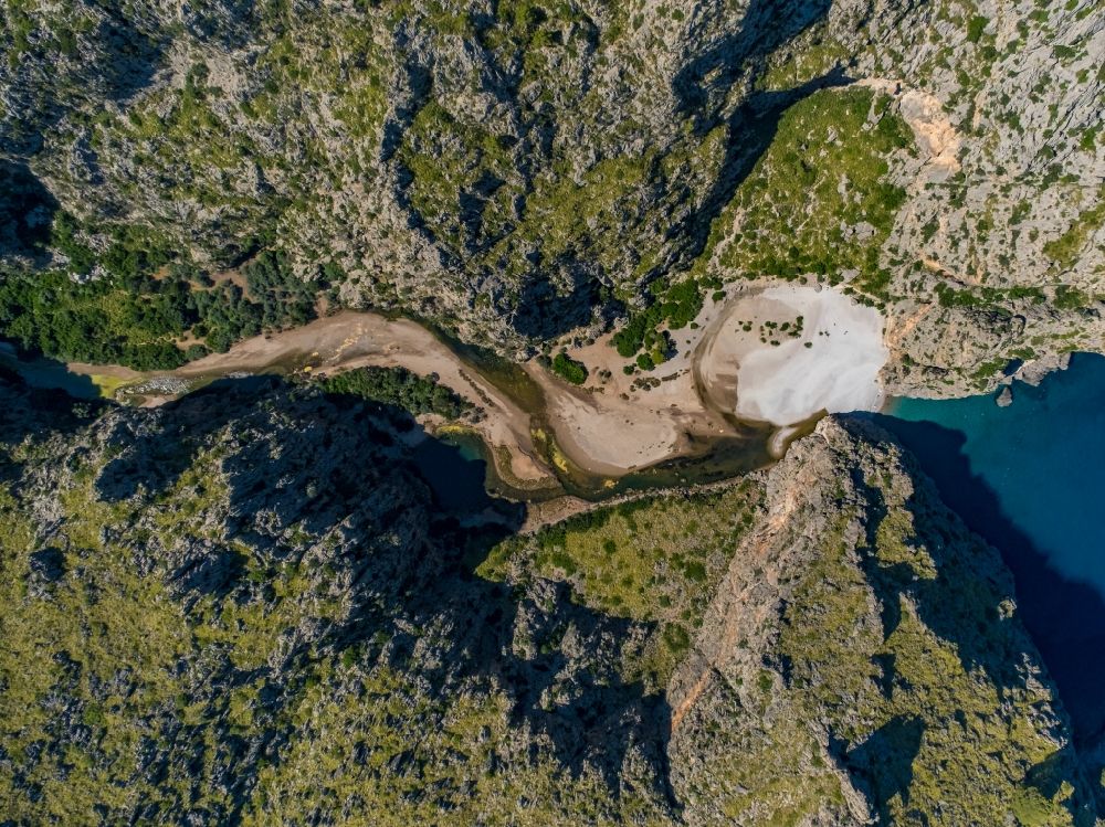 Aerial photograph Escorca - Rock and mountain landscape on bay Torrent de Pareis La Calobra in Escorca at Serra de Tramuntana in Balearic island of Mallorca, Spain