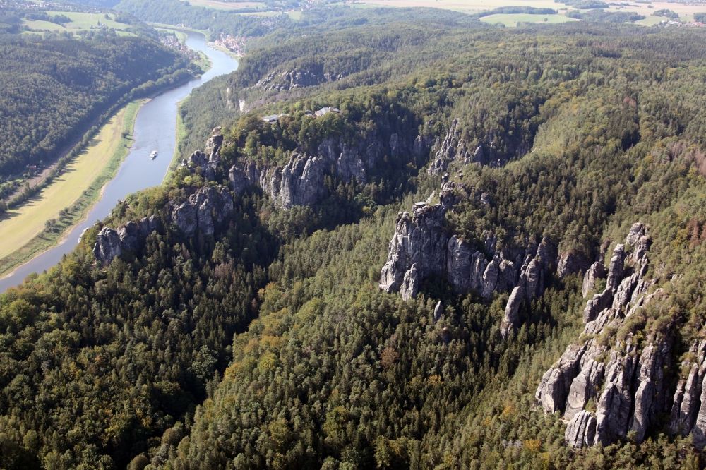 Aerial image Rathen - Mountain landscape of the Elbe Sandstone Mountains and the Elbe river with a paddle steamer in Rathen in the state Saxony, Germany