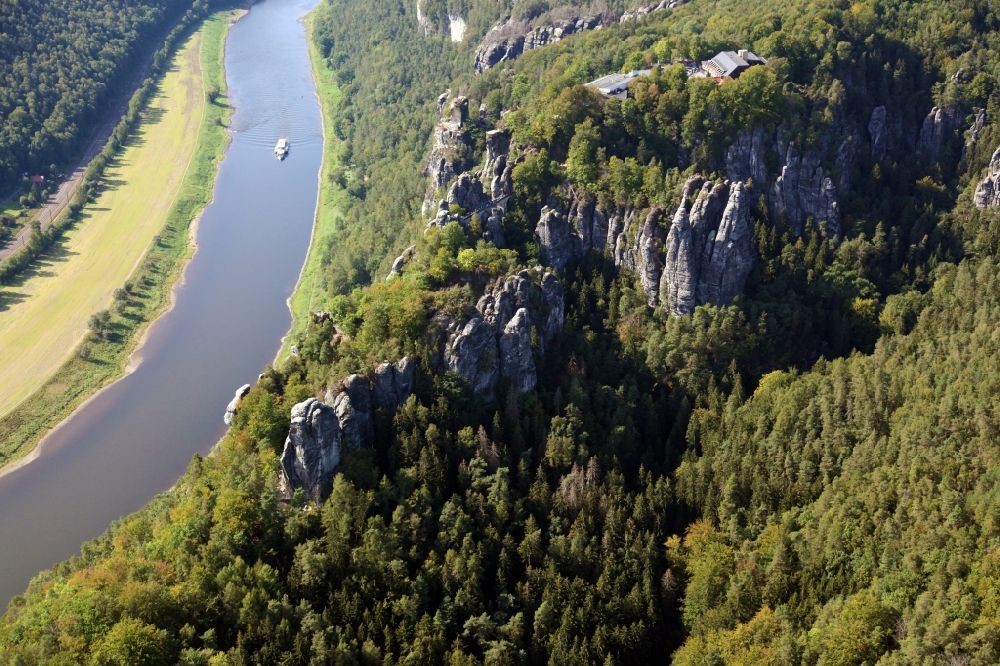 Aerial photograph Rathen - Mountain landscape of the Elbe Sandstone Mountains and the Elbe river with a paddle steamer in Rathen in the state Saxony, Germany
