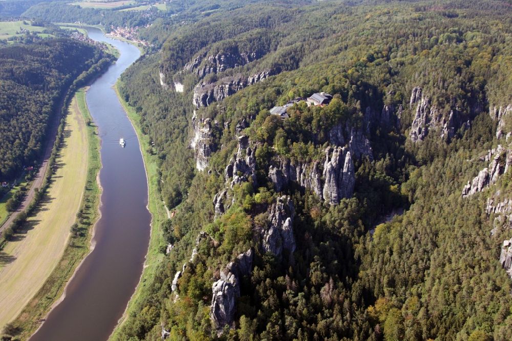 Aerial image Rathen - Mountain landscape of the Elbe Sandstone Mountains and the Elbe river with a paddle steamer in Rathen in the state Saxony, Germany