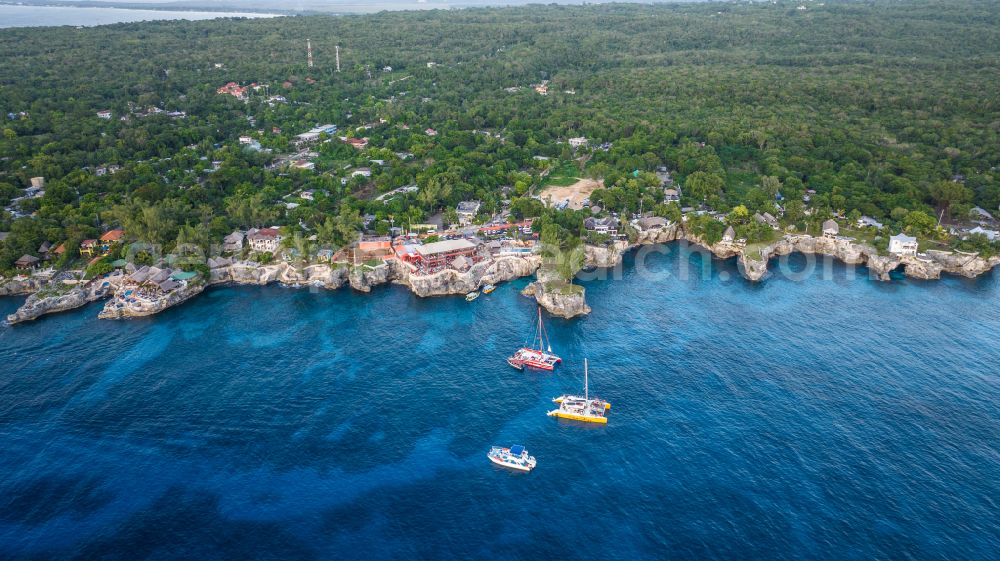 Aerial image Negril - Rock Coastline on the cliffs Rick's Cafe Negril in Negril in Westmoreland Parish, Jamaica