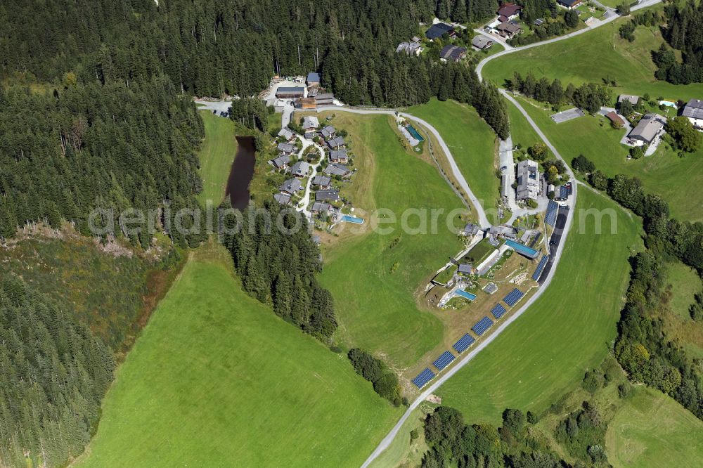Sonnberg from the bird's eye view: Holiday house plant of the park Bergdorf Priesteregg Premium Resort in Sonnberg in Salzburg, Austria