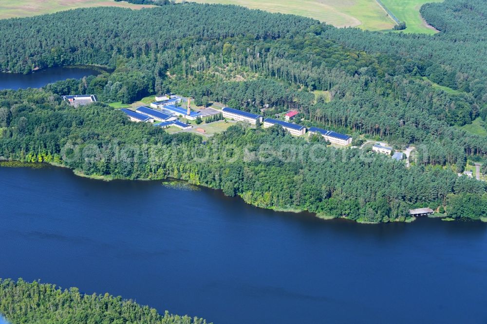 Aerial image Kuhlmühle - Holiday home complex of the holiday park and former training center and pioneer camp of the GDR on Kuhlmuehler Strasse on the banks of the Grosser Baalsee in Kuhlmuehle in the state Brandenburg, Germany