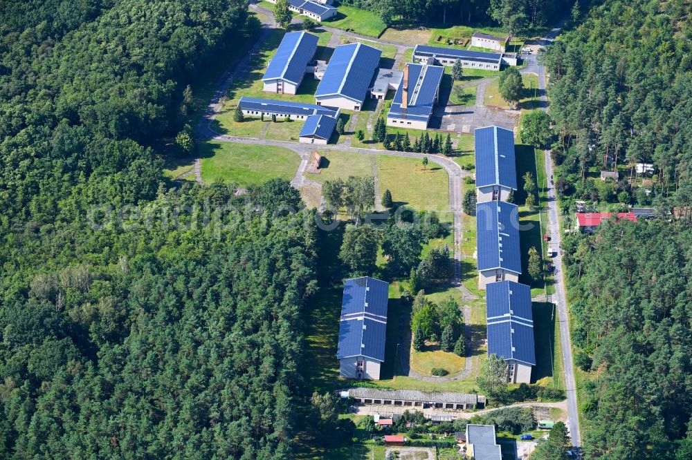 Aerial image Kuhlmühle - Holiday home complex of the holiday park and former training center and pioneer camp of the GDR on Kuhlmuehler Strasse on the banks of the Grosser Baalsee in Kuhlmuehle in the state Brandenburg, Germany