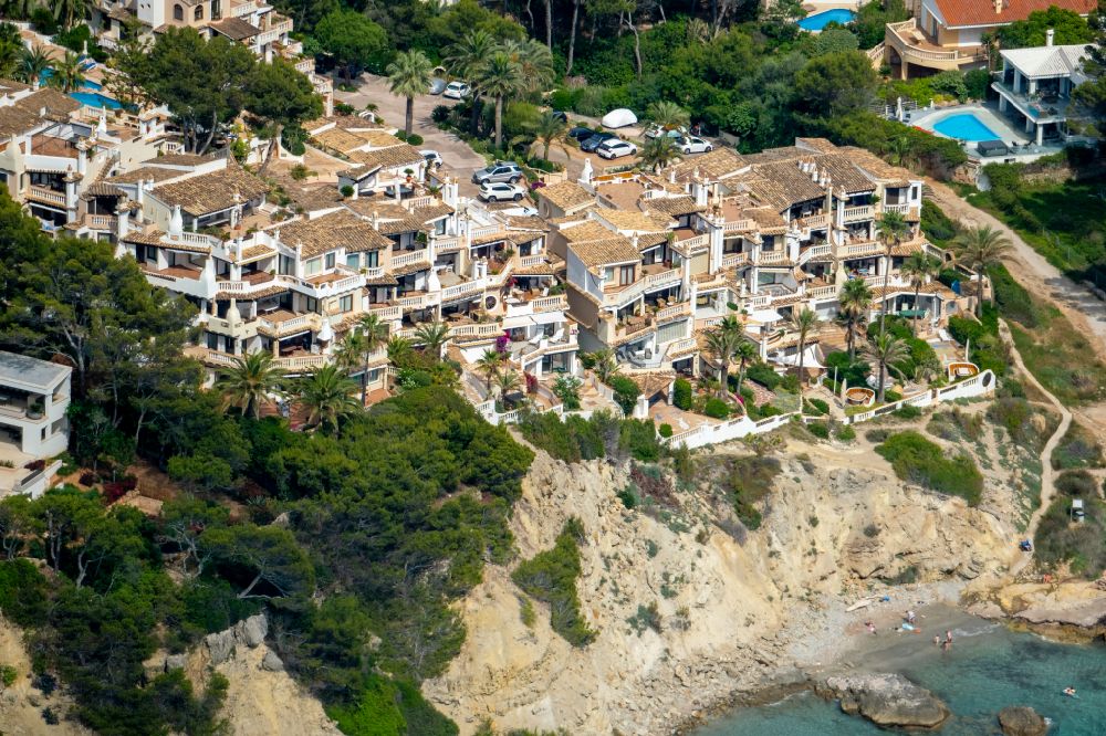 Aerial image Costa de la Calma - Building of an apartment building used as an apartment complex Club Monte de Oro on street Carrer Mirador in Costa de la Calma in Balearic island of Mallorca, Spain