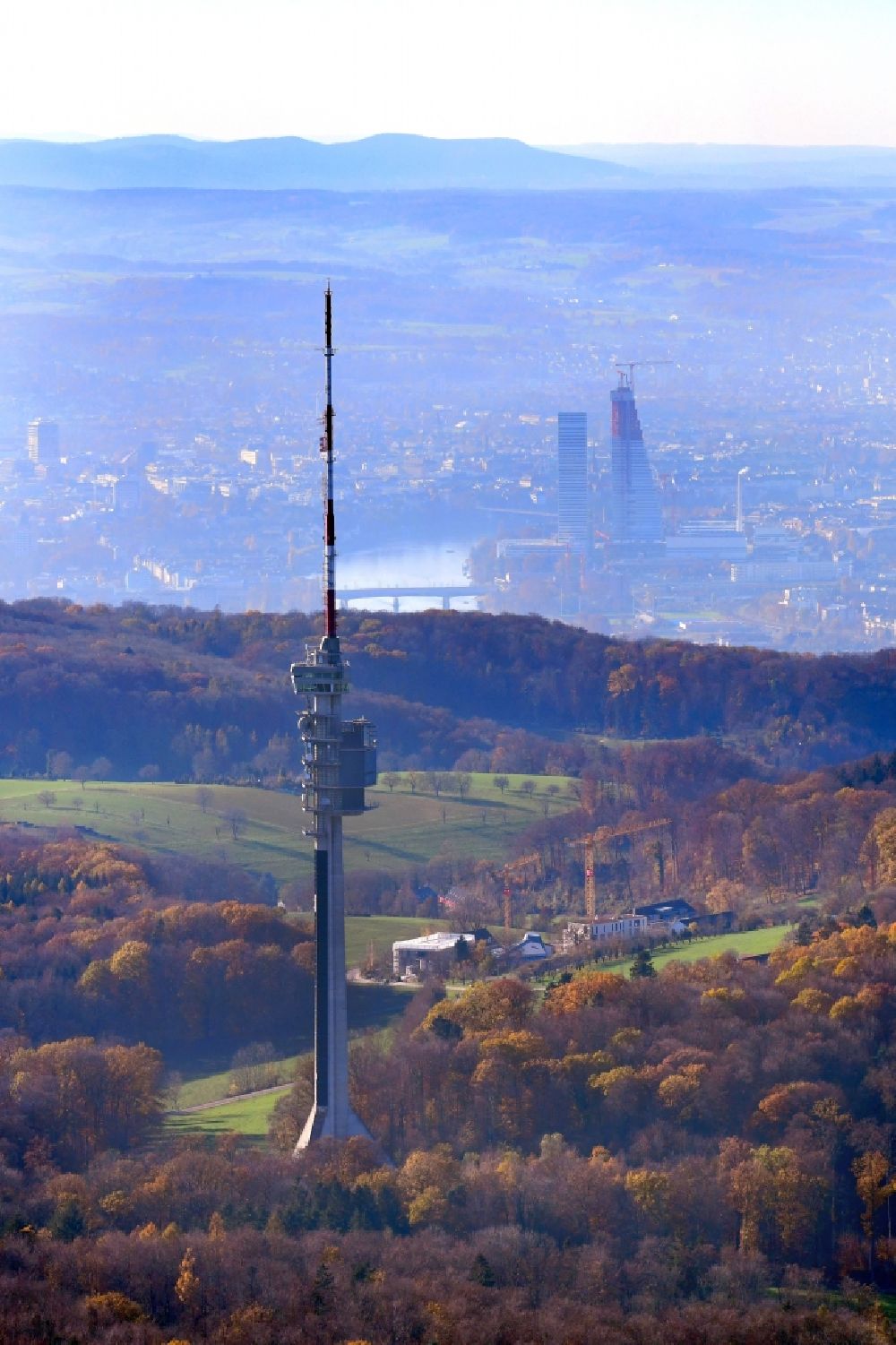 Bettingen from the bird's eye view: Weather with layered haze at St. Chrischona television tower on Hohestrasse in Bettingen in the canton Basel, Switzerland. Looking to the skyline of Basle