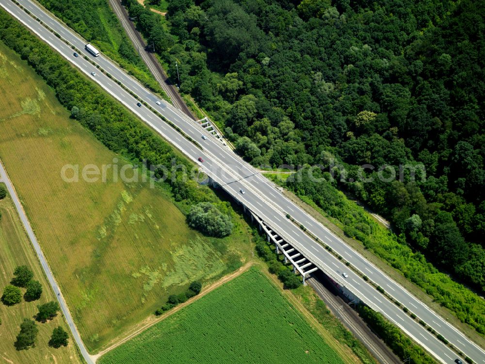 Kusterdingen from above - Route and lanes of the trunk road - federal highway B27 with crossing of the railway line in Kusterdingen in the state Baden-Wuerttemberg, Germany
