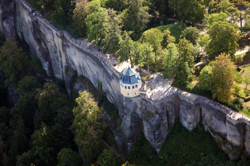 Aerial photograph Königstein - The Fortress Koenigstein at the river Elbe in the county district of Saxon Switzerland East Erzgebirge in the state of Saxony. The fortress is one of the largest mountain fortresses in Europe and is located amidst the Elbe sand stone mountains on the flat top mountain of the same name
