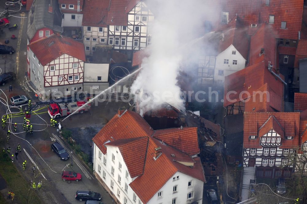 Hann. Münden from above - Extinguishing action of the fire brigade at the source of the fire and smoke formation in an apartment building Aegidiiplatz corner Wallstrasse in Hann. Muenden in the state Lower Saxony, Germany