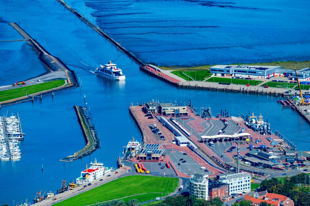 Norden from above - Ferry port facilities on the sea coast of the North Sea with the ferry Frisia 4 in the district of Norddeich in Norden in the state of Lower Saxony, Germany