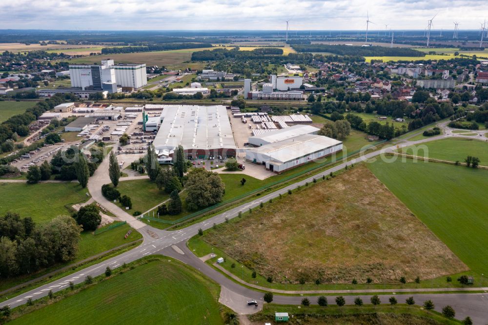 Karstädt from above - Company grounds of Braas GmbH in Karstaedt in the state of Brandenburg. The facilities include storage halls and roof tile works