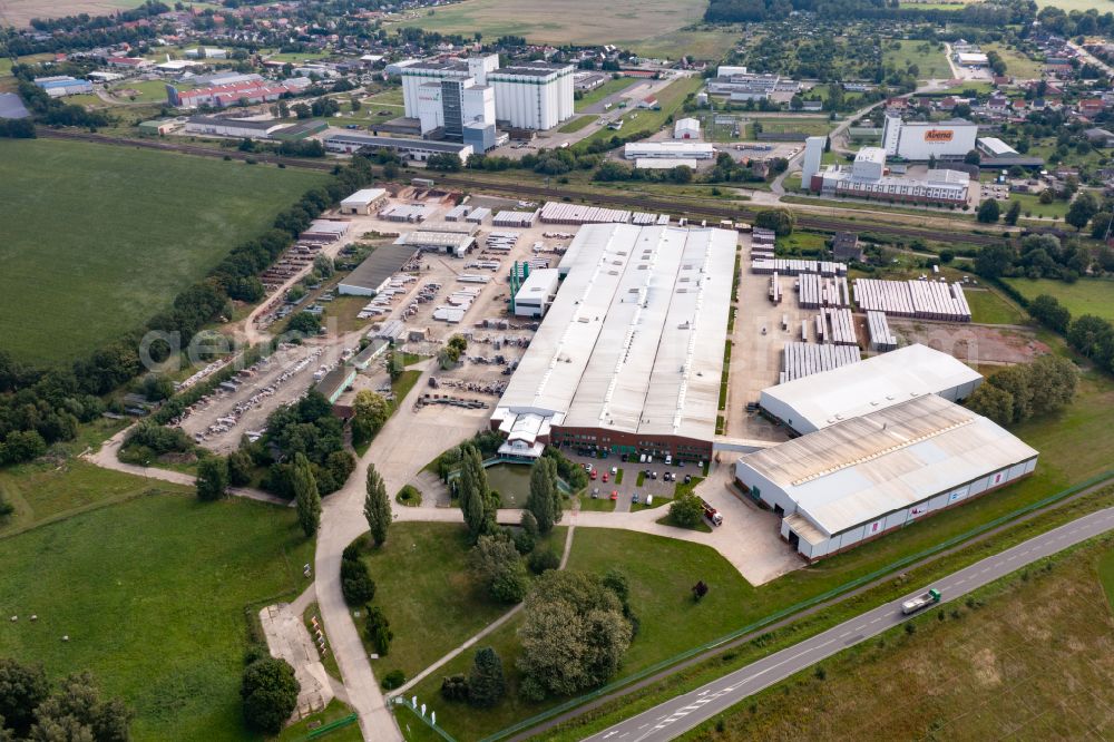 Aerial photograph Karstädt - Company grounds of Braas GmbH in Karstaedt in the state of Brandenburg. The facilities include storage halls and roof tile works
