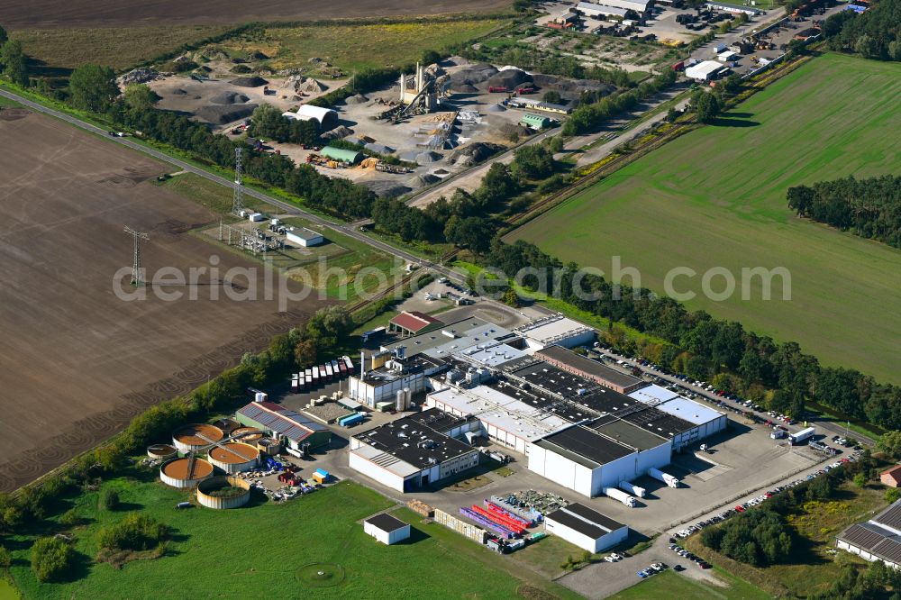 Neustadt-Glewe from the bird's eye view: Company grounds and facilities of Friedrich Lange GmbH on street Am Brenzer Kanal in Neustadt-Glewe in the state Mecklenburg - Western Pomerania, Germany