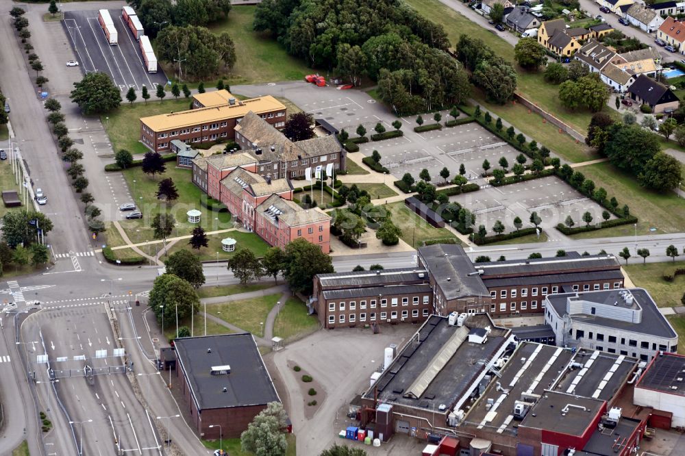 Höganäs from the bird's eye view: Company grounds and facilities of Hoeganaes Holding AB on street Bruksgatan in Hoeganaes in Skane laen, Sweden
