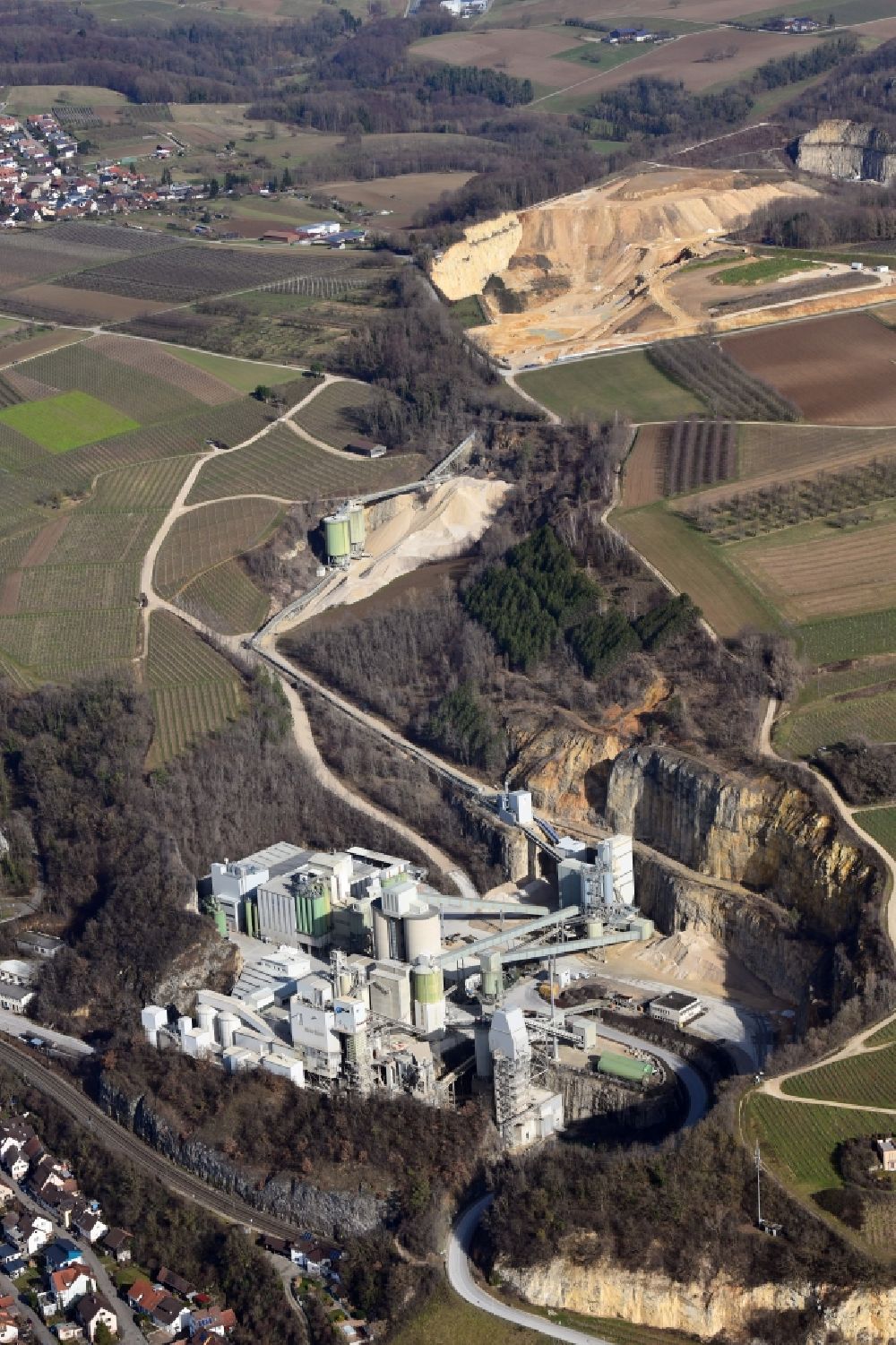 Efringen-Kirchen from above - Company grounds and facilities of Lhoist-Group with the limestone factory in the district Istein in Efringen-Kirchen in the state Baden-Wurttemberg, Germany