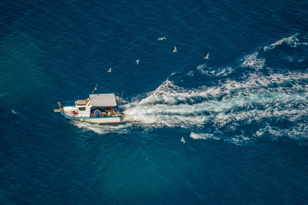Alcudia from above - Fishing - ship in the Bucht von Alcudia in Alcudia in Balearic island of Mallorca, Spain