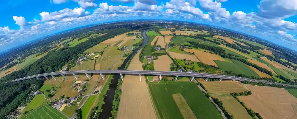 Aerial photograph Mintard - Fisheye perspective routing and traffic lanes over the highway bridge in the motorway A 52 over the shore of river Ruhr in Muelheim on the Ruhr in the state North Rhine-Westphalia, Germany