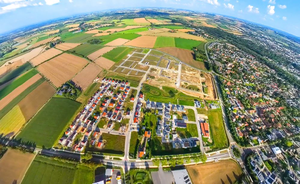 Soest from the bird's eye view: Fisheye perspective construction sites for new construction residential area of detached housing estate Neuer Soester Norden between Oestinghauser Landstrasse and Weslarner Weg in Soest in the state North Rhine-Westphalia, Germany