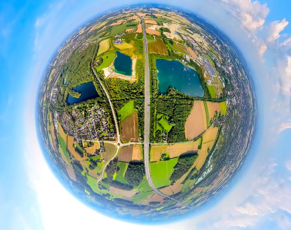 Aerial photograph Beckum - Fisheye perspective leisure facility with a water ski cable car Park am Tuttenbrocksee in Beckum in the federal state of North Rhine-Westphalia, Germany