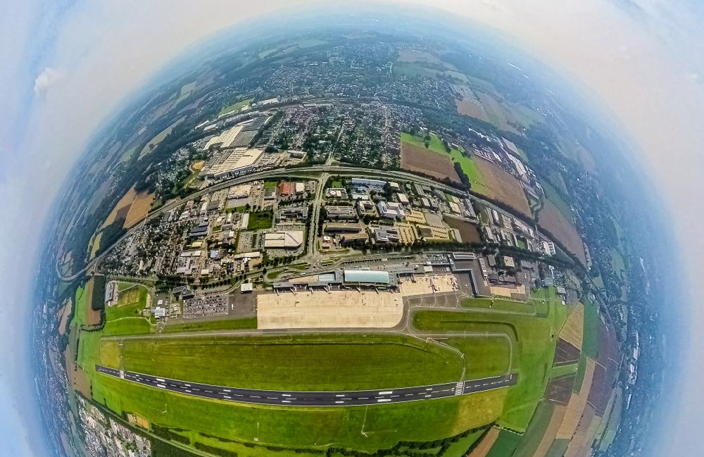 Aerial photograph Dortmund - Fisheye perspective runway with hangar taxiways and terminals on the grounds of the airport on street Flughafenring in Dortmund at Ruhrgebiet in the state North Rhine-Westphalia, Germany