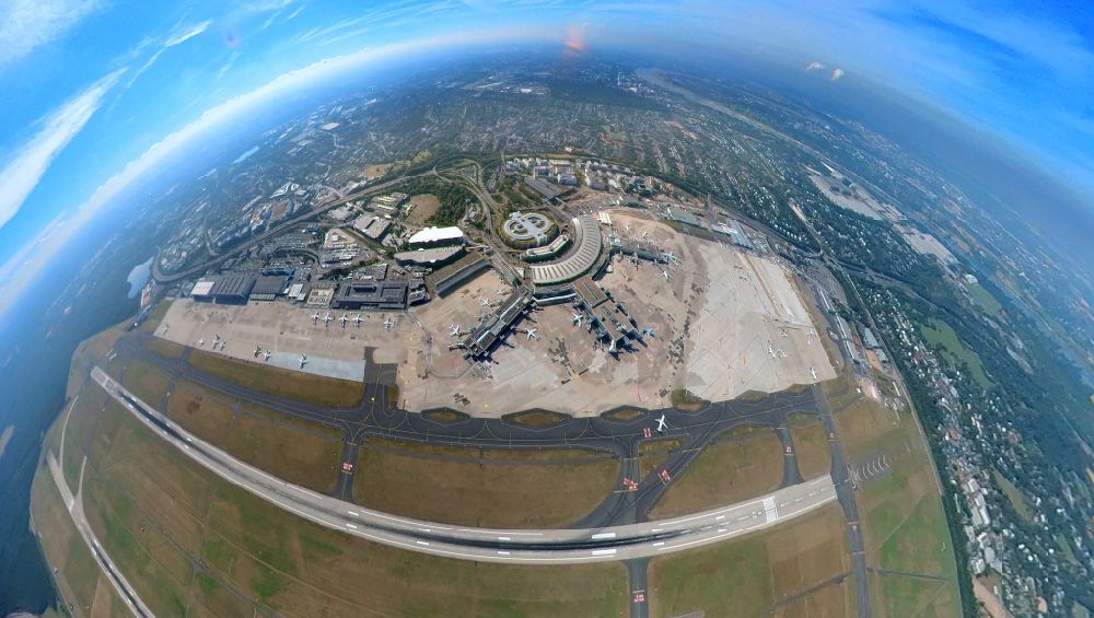 Düsseldorf from the bird's eye view: Fisheye perspective runway with hangar taxiways and terminals on the grounds of the airport in Duesseldorf at Ruhrgebiet in the state North Rhine-Westphalia