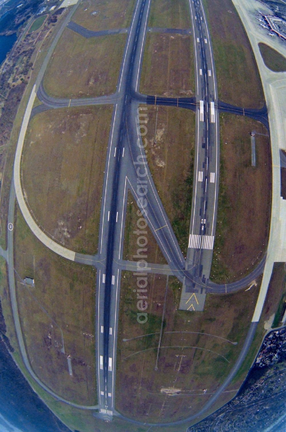 Aerial image Berlin - Fisheye perspective runway with hangar taxiways and terminals on the grounds of the airport Tegel TXL in the district Reinickendorf in Berlin, Germany