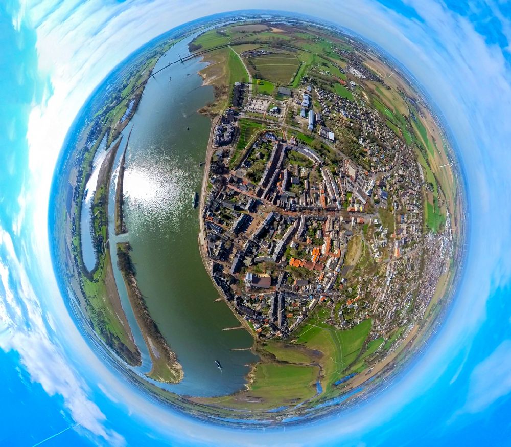 Rees from the bird's eye view: Fisheye perspective city view on the river bank of the Rhine river in Rees in the state North Rhine-Westphalia, Germany