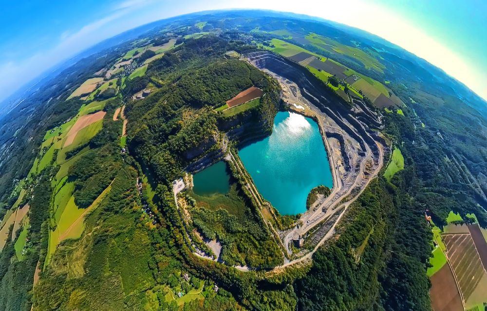 Aerial image Eisborn - Fisheye perspective quarry for the mining and handling of limestone in Eisborn in the state North Rhine-Westphalia, Germany