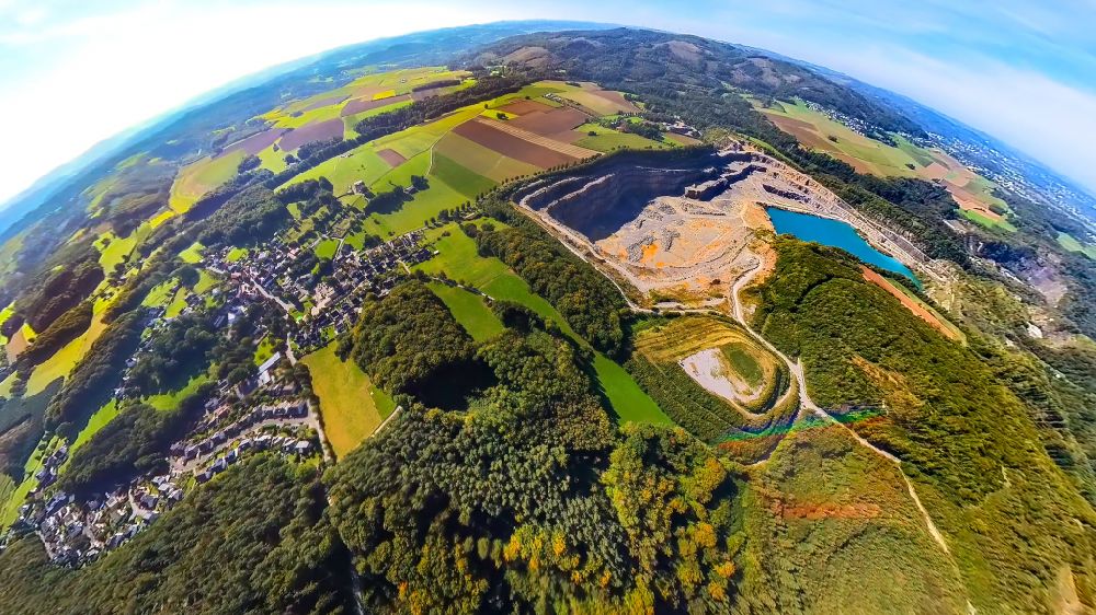 Eisborn from above - Fisheye perspective quarry for the mining and handling of limestone in Eisborn in the state North Rhine-Westphalia, Germany