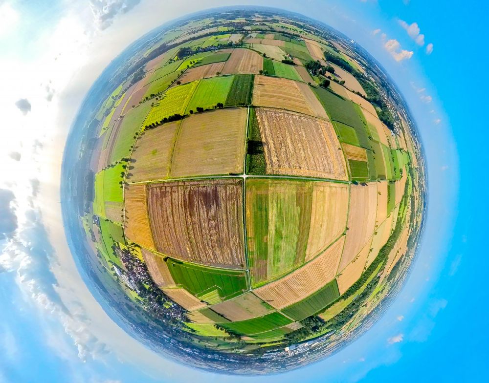 Sönnern from above - Fisheye perspective structures on agricultural fields in Soennern in the state North Rhine-Westphalia, Germany