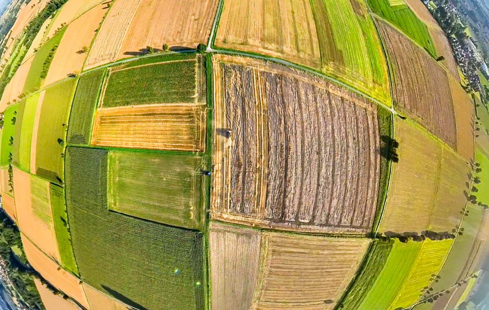 Sönnern from the bird's eye view: Fisheye perspective structures on agricultural fields in Soennern in the state North Rhine-Westphalia, Germany