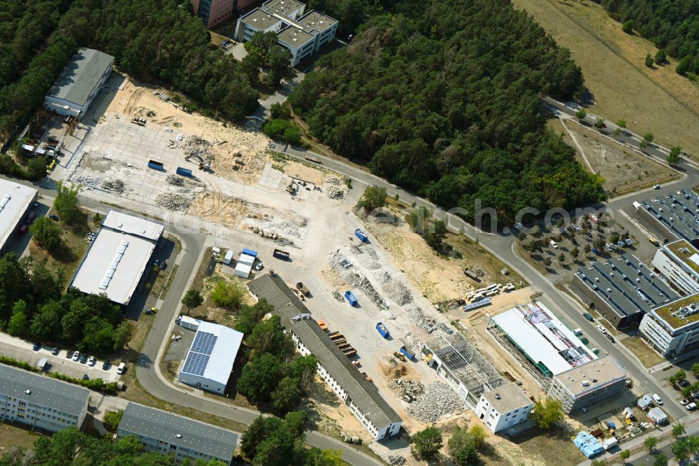 Aerial image Berlin - Construction site for surface demolition and unsealing work to expand the production site of the German Institute for Cell and Tissue Replacement gGmbH in the Innovation Park Wuhlheide (IPW) in Berlin, Germany