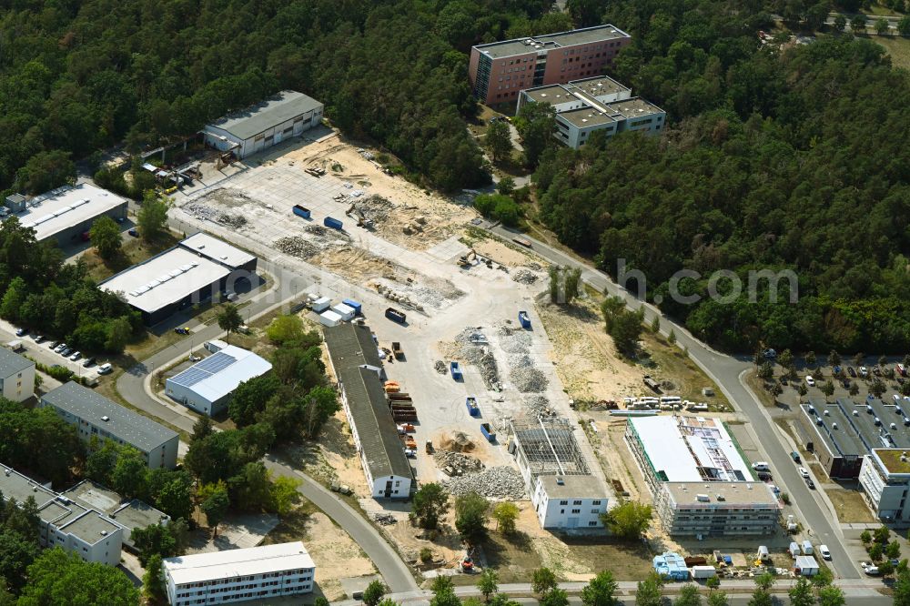 Aerial photograph Berlin - Construction site for surface demolition and unsealing work to expand the production site of the German Institute for Cell and Tissue Replacement gGmbH in the Innovation Park Wuhlheide (IPW) in Berlin, Germany