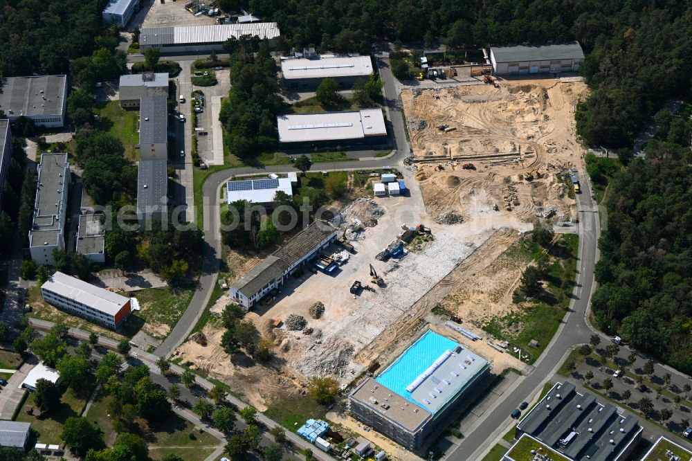 Berlin from the bird's eye view: Construction site for surface demolition and unsealing work to expand the production site of the German Institute for Cell and Tissue Replacement gGmbH in the Innovation Park Wuhlheide (IPW) in Berlin, Germany