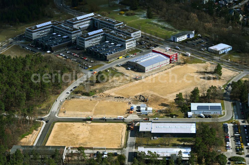 Berlin from the bird's eye view: Construction site for surface demolition and unsealing work to expand the production site of the German Institute for Cell and Tissue Replacement gGmbH in the Innovation Park Wuhlheide (IPW) on street Koepenicker Strasse in the district Koepenick in Berlin, Germany