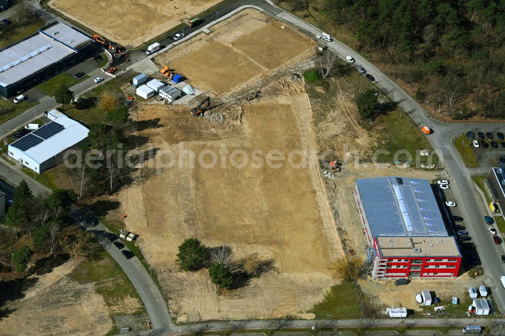 Aerial image Berlin - Construction site for surface demolition and unsealing work to expand the production site of the German Institute for Cell and Tissue Replacement gGmbH in the Innovation Park Wuhlheide (IPW) on street Koepenicker Strasse in the district Koepenick in Berlin, Germany