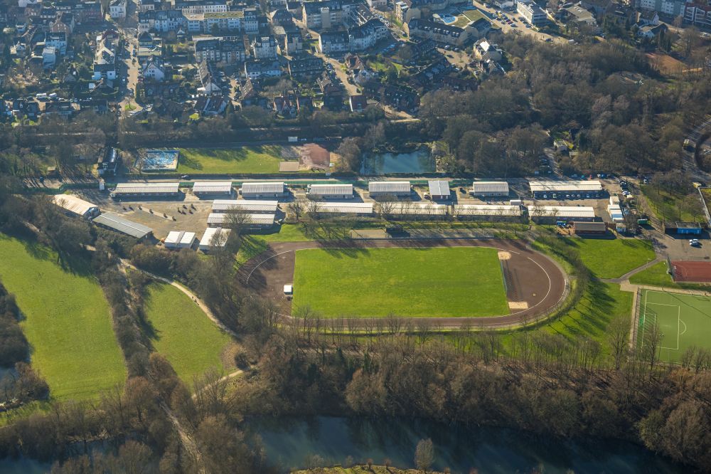 Aerial photograph Mülheim an der Ruhr - Construction site for the new building of Asylum accommodation buildings place Saarner Kirmesplatz on Stadium in Muelheim an der Ruhr in the state North Rhine-Westphalia