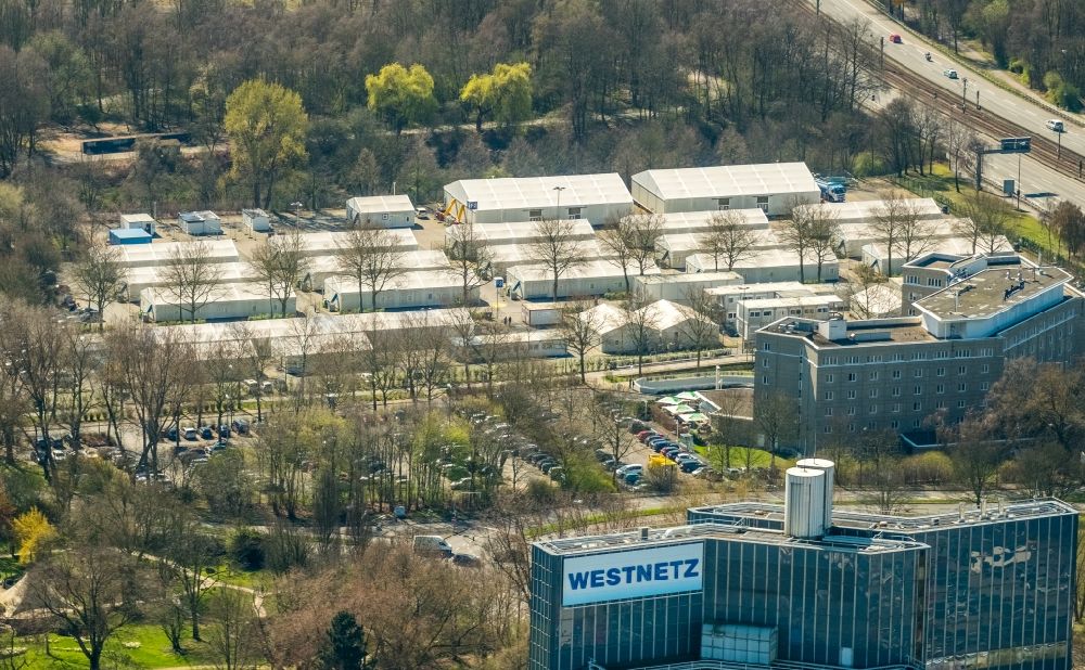 Aerial image Dortmund - Refugee's home and asylum lodging tent camp as a temporary accommodation in the Ruhr avenue on the parking bay Buschmuehle in Dortmund in the federal state North Rhine-Westphalia