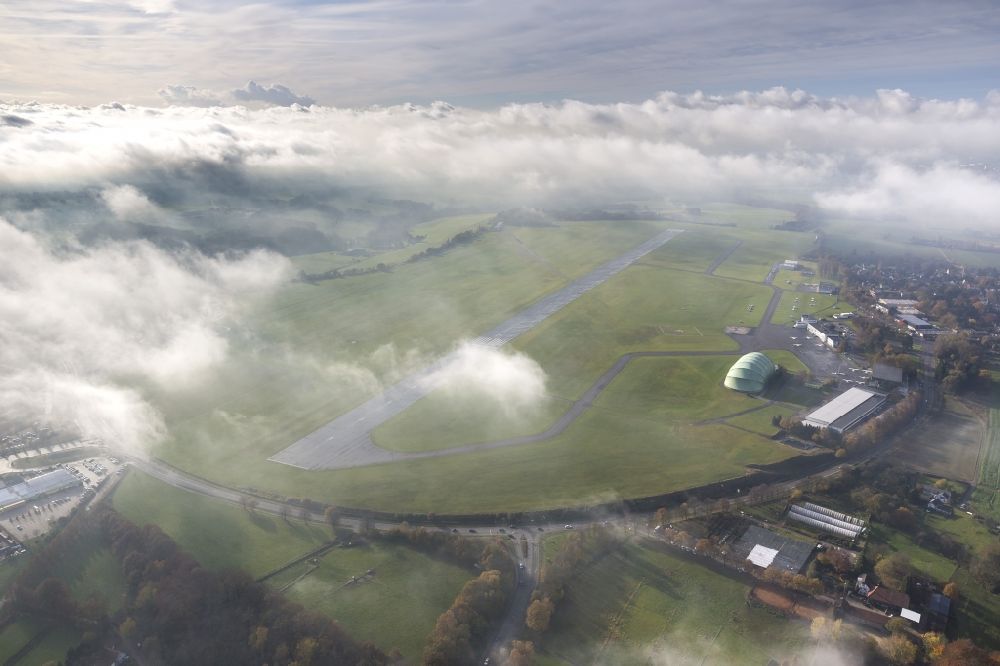 Aerial image Essen - Essen-Muelheim Airport in a hole in the clouds in Muelheim an der Ruhr in the Ruhr area in North Rhine-Westphalia
