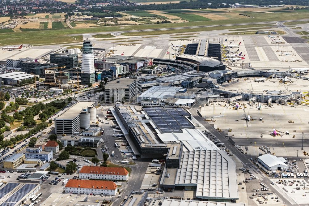 Schwechat from the bird's eye view: Tower and terminals on the premises of Vienna International Airport in Schwechat in Lower Austria, Austria